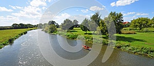 The River Ouse at  Great Barford Bedfordshire England with canoe photo