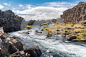 The river Oxara flowing through the Almannagja rift in the Thingvellir national park in Iceland