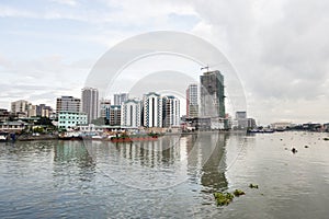 River Pasig with city skyline, Manila Philippines photo