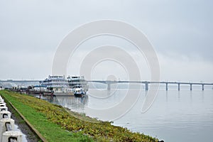 The river port dock cruise ships boat dock, away bridge, fog, low