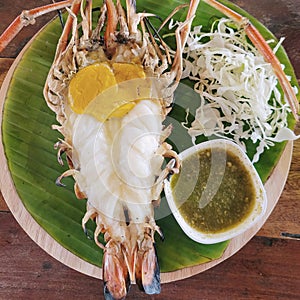 River prawn grilled, big river lobster, tradition dish in the Chao Phraya river bassin, Ayutthaya, Thailand, Thai food