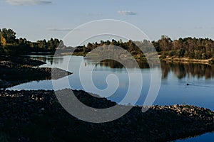 The river with a quiet current and clouds reflected in it, Soz , Gomel, Belarus