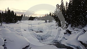 River rapids at sunset near East Valadalen Fjallstation in Jamtland in Sweden