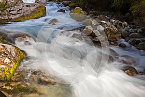 River rapids washing over rocks with silky look