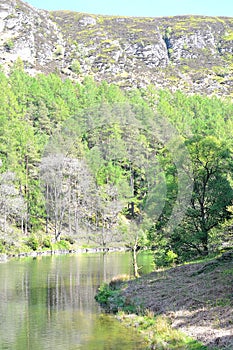 river with reflection in Elan Valley in Wales, UK