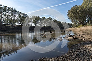 River reflections vapour trail