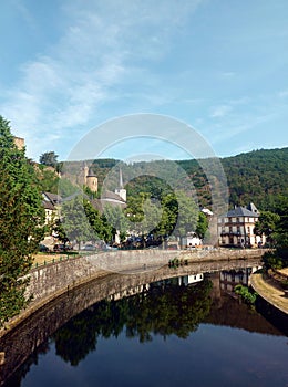 River river Sauer and village Esch-sur-Sure in the Ardennes of Luxembourg