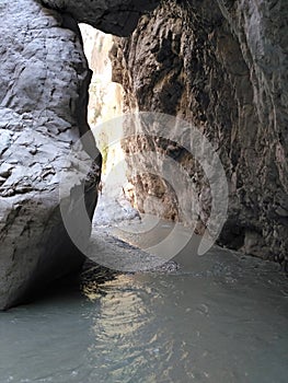 The river between the rocks of the canyon