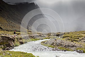 River, rocks and clouds in Collanes Valley in El Altar volcano