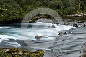 River with rocks and milky water