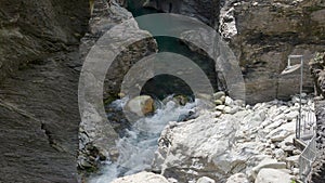 River between rocks of a narrow gorge. Stream of water is squeezed between the sides of the rocks. Viamala Gorge, Viamala-Schlucht