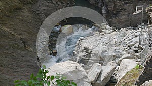 River between rocks of a narrow gorge. Stream of water is squeezed between the sides of the rocks. Viamala Gorge, Viamala-Schlucht