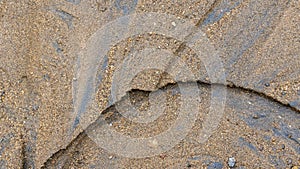 River sand texture with a mixture of iron ore and pebbles