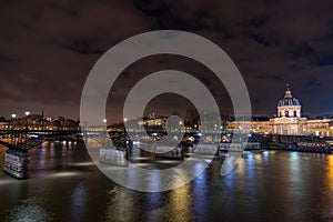 River Seine with Pont des Arts and Institut de France at night i