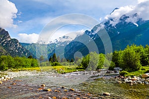 From the river shore opens view on fantastic glacier.