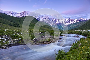 From the river shore opens view on fantastic glacier.