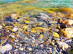 River shore shallow water pebbles