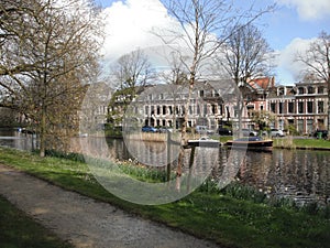 River side view with boats and houses