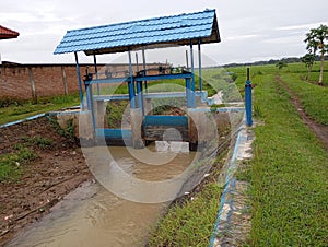 river sluice gate to irrigate rice fields