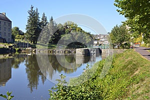 River and sluice at Josselin in France photo