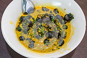 river snail with betel leaves curry