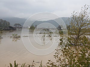 The river spilled flood is dangerous for everyone