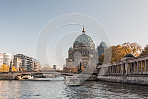 River Spree with bridge and Berlin Cathedral and Boat on River