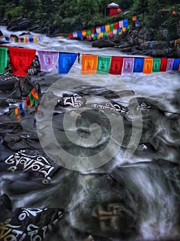 A river with stone inscriptions of Tibetan scriptures