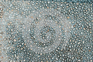 River stone surface.