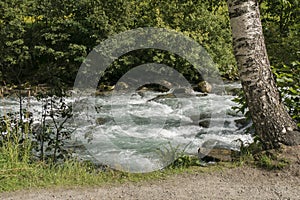 River Storfossen runs down the mountain to the Geiranger Fjord, Norway. Nature landscape, river.