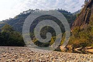 The river and the strange shaped rocks background around Wuyishan, China