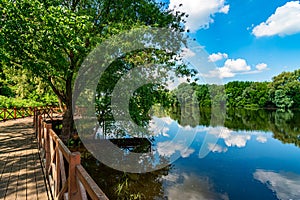 River and summer  scenery. Panoramic view of valley of river. Peaceful summer landscape with green hills, beautiful woods