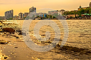 River at sunset and view of the evening city. Rostov-on-don