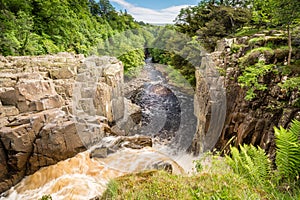 River Tees flows over High Force photo