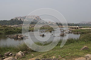 River and Temple in Hampi, India photo