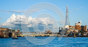 River Thames with the Millennium Bridge and The Shard in London photo