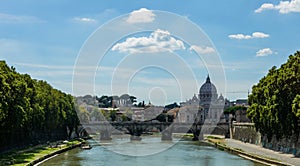 River tiber in rome italy with st peters basilica in the background