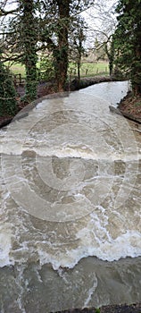 River Tiffey, Wymondham, Norfolk, England, UK after Heavy Rain & Storm Henk