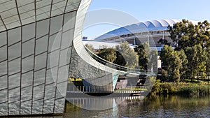 The river torrens foot bridge with adelaide oval in the background in adelaide south australia on april 2nd 2021