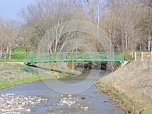 River, tree and park views around Bean Creek Garfield Park in Indianapolis Indiana