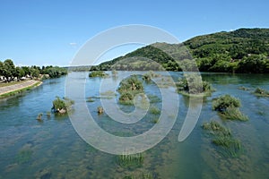 River Una on a summer day in Hrvatska Kostajnica, Croatia photo