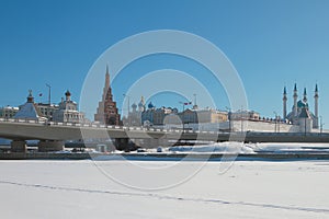 River under snow cover, bridge and Kremlin. Kazan, Russia
