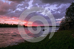 River under thunderhead clouds sky