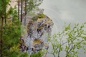 The blue ribbon of the river from the height of the mountains. Wild nature, taiga. Tourism. Far East, Sakhalin Island, Russia.