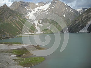 River view with big mountains, mountains covered with snow, mountain in kashmir, lake in kashmir photo