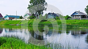 River in the village in the early morning