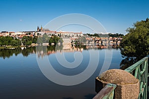 River Vltava in Prague, Czech Republic with Charles Bridge and Saint Vitus Cathedral