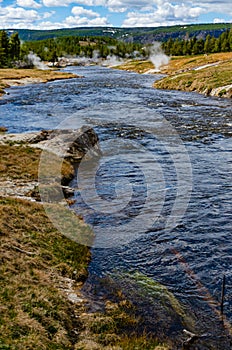 River with warm water in the valley of the Yellowstone National Park, USA