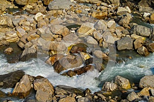 River water stream running among stones