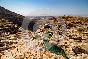 River Waterfall and pond in Wadi Darbat near Salalah photo